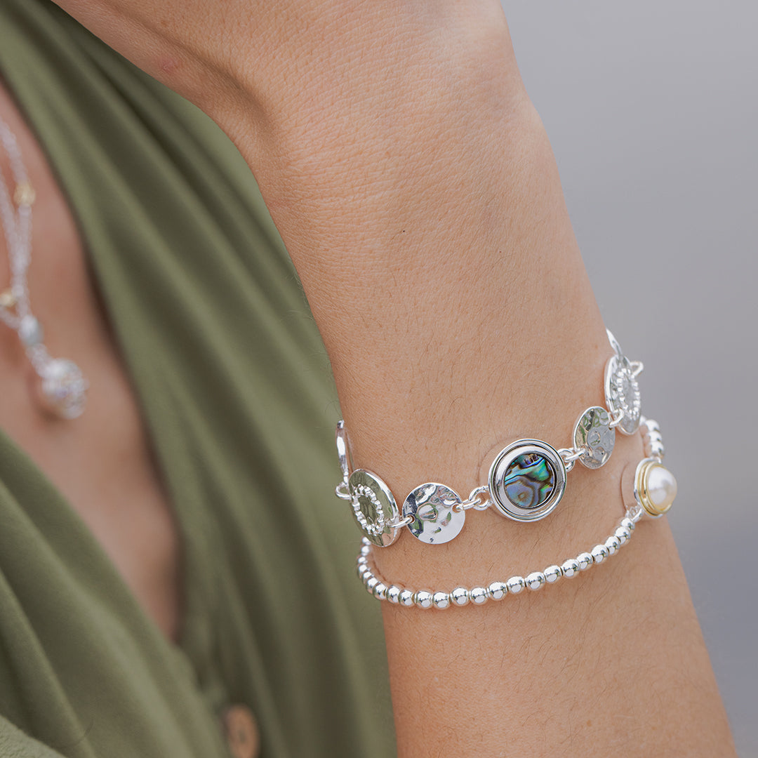 Layered silver dainty bracelets by Style Dots jewelry