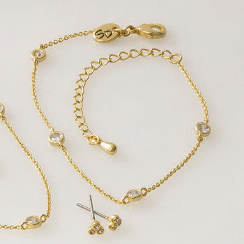 Gold dainty bracelet, necklace and earrings by Style Dots