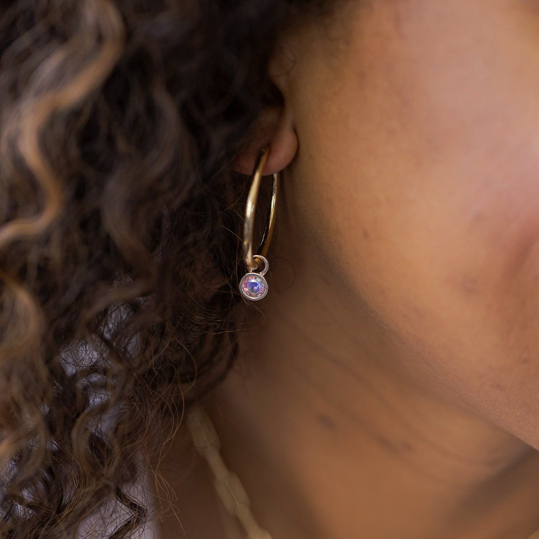 Dainty gold hoop earrings withy crystal charm accent