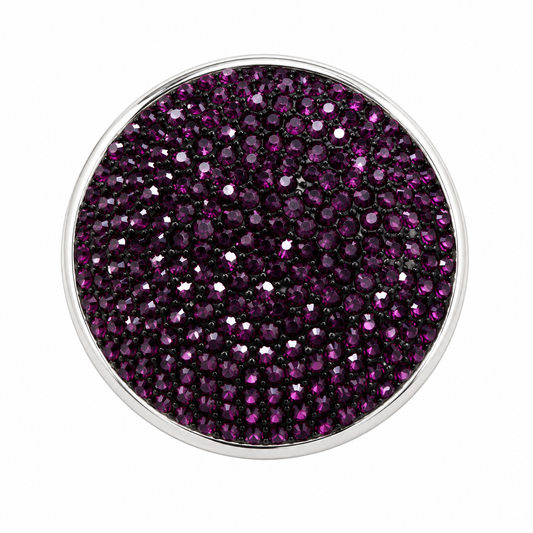 A round silver-toned Statement Dot, set densely paved with small faceted dark purple gemstones, shown against a plain white background.
