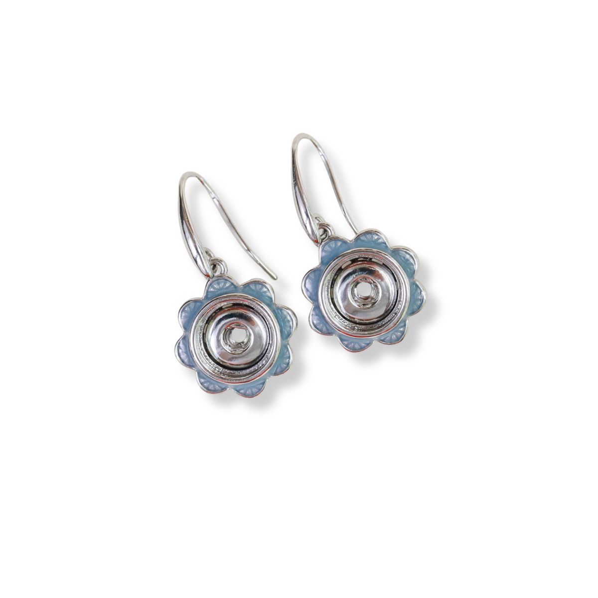 A pair of silver drop earrings with light blue enamel flower petals and a clear central stone, shown on a plain white background.
