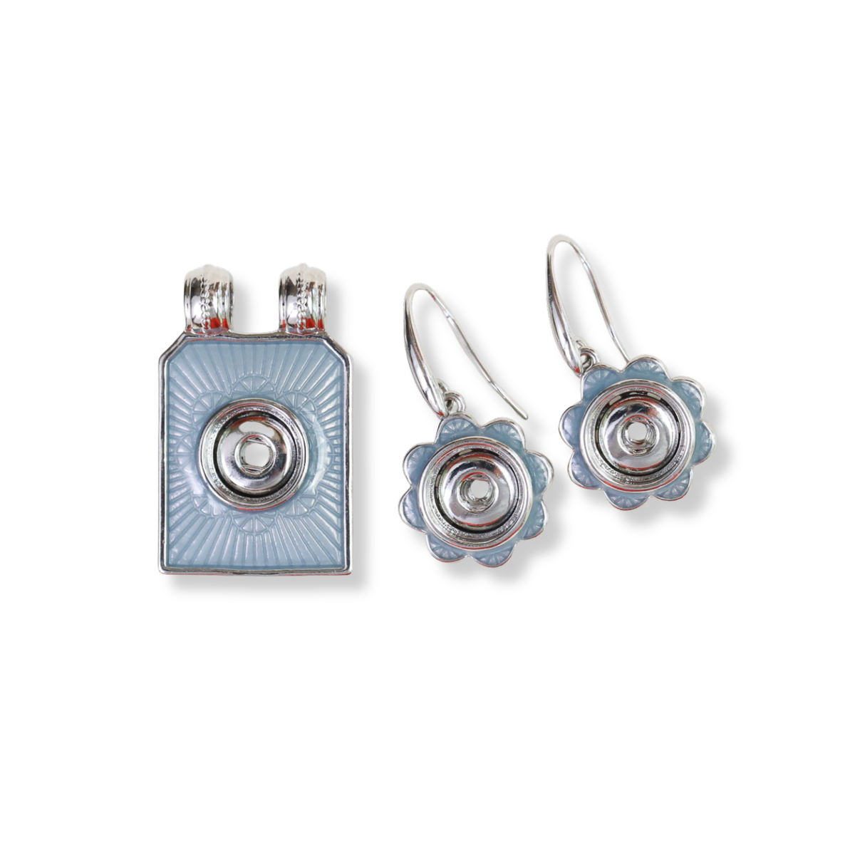 A jewelry set featuring a rectangular pendant and matching flower-shaped drop earrings, both with light blue enamel and silver-tone metal details, shown on a plain white background. Can fit a Dotlet size for the pendant and earrings. 