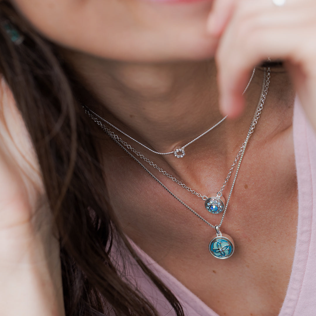 Layering jewelry with dainty necklaces