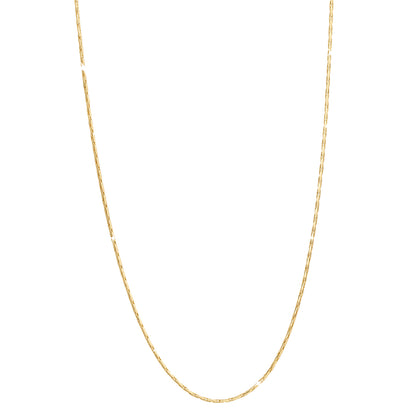 Detail of gold cobra chain necklace for layering jewelry