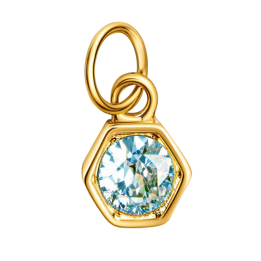 A gold hexagonal pendant charm featuring a faceted light blue gemstone, isolated on a solid white background.