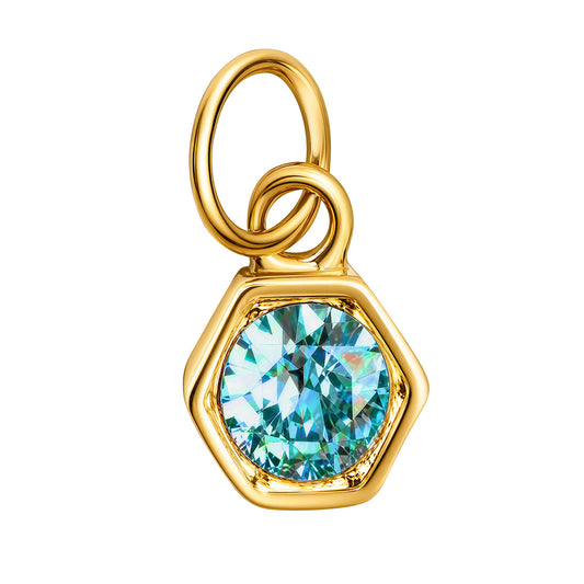 A gold hexagonal pendant charm featuring a faceted light blue gemstone, isolated on a solid white background.
