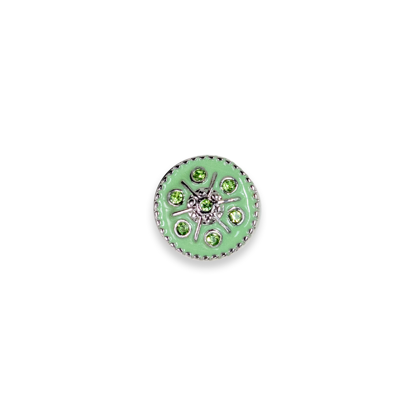 A round silver-toned dot featuring a light green enamel center, surrounded by small green gemstones and a silver floral starburst design, set against a plain white background.
