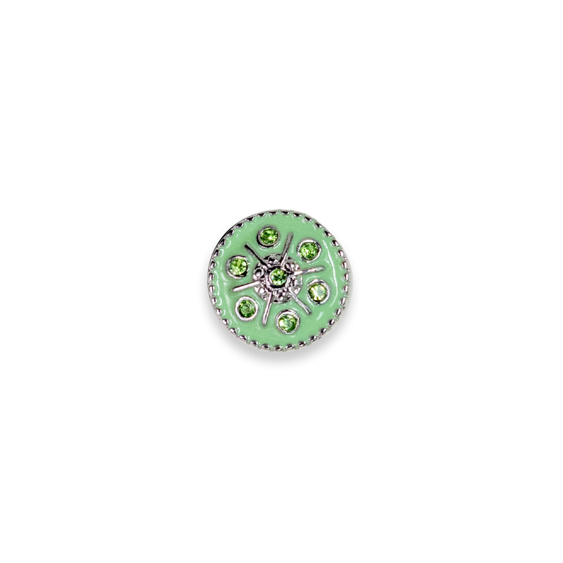 A round silver-toned dot featuring a light green enamel center, surrounded by small green gemstones and a silver floral starburst design, set against a plain white background.