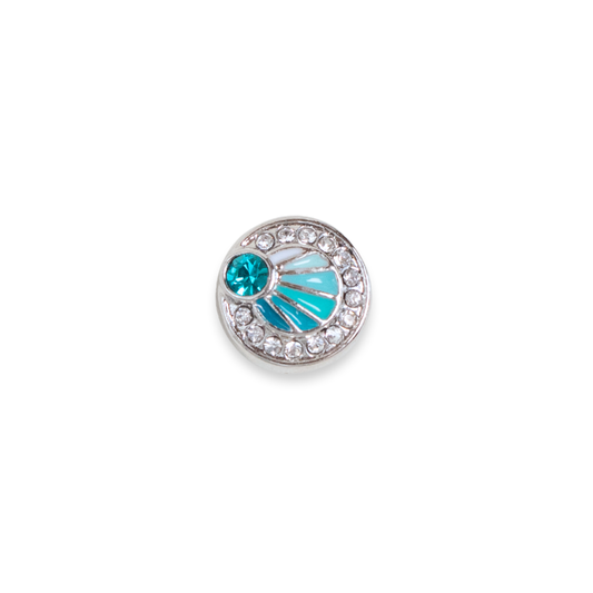 A single round silver-toned dot featuring a turquoise blue fan-shaped enamel inlay, a central round turquoise stone, and a border of clear rhinestones, shown on a plain white background.