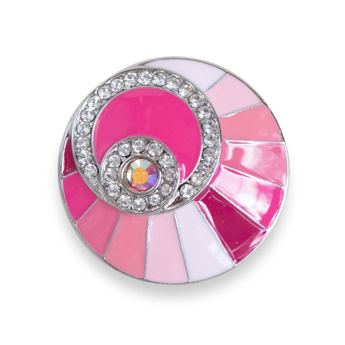 A single round silver-toned dot featuring a pink fan-shaped enamel inlay, a central round iridescent pink stone, and a border of clear rhinestones, shown on a plain white background. This size is the Statement size released in September/ October 2026