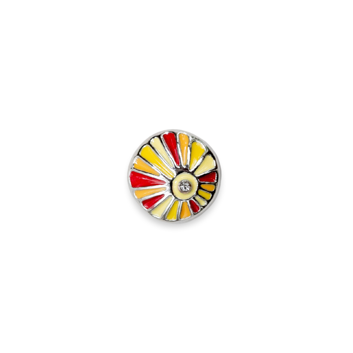 A round enamel pin shaped like a Sunburst fan pattern, featuring red, yellow, and cream with a silver-tone metal border and a small clear rhinestone in the center, set against a plain white background. 