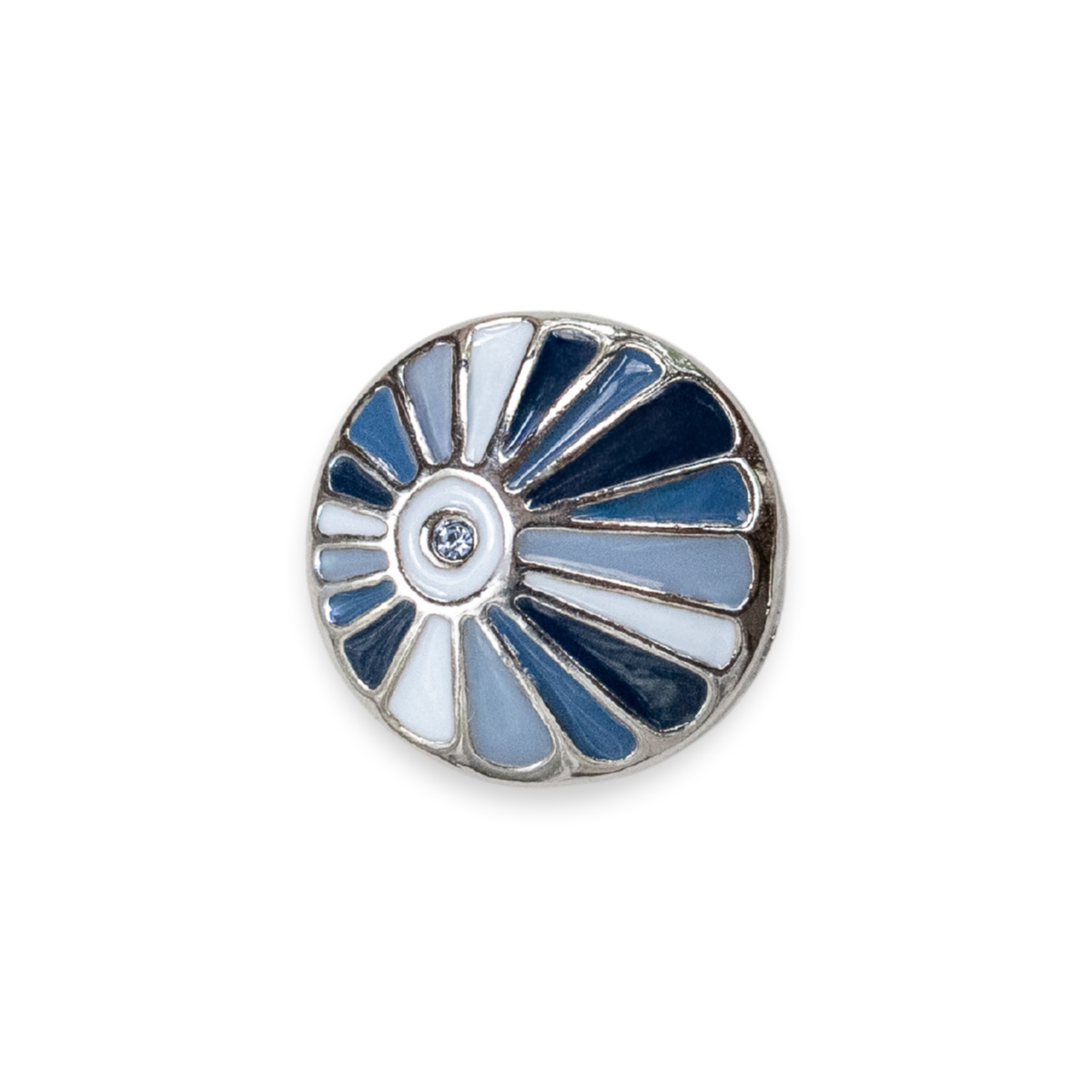 A round silver-toned interchangeable Dot, featuring a fan-like enamel pattern in shades of blue, navy, and white, with a small clear crystal at the center, shown on a plain white background.