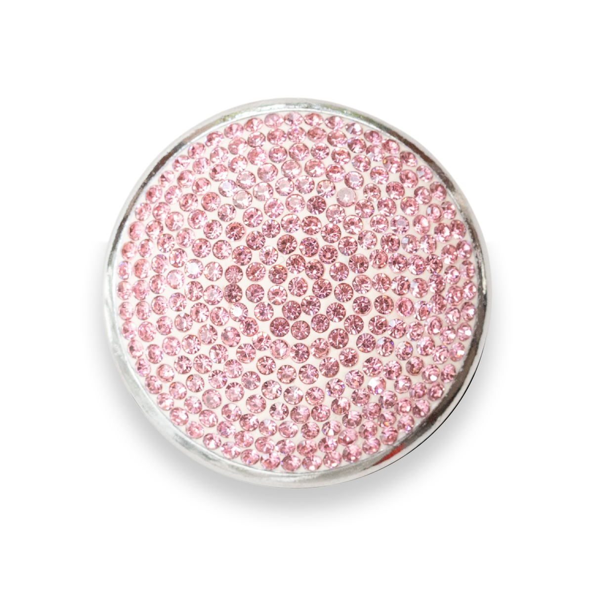 A round silver-toned metal tray filled with densely packed small pink rhinestones, shown on a clean white background.