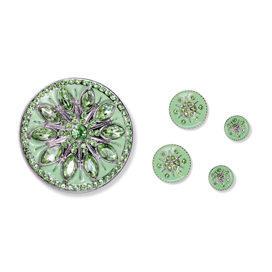 A set of circular green enamel jewelry pieces with silver-toned metal borders and clear marquise and round stones, arranged on a plain white background.