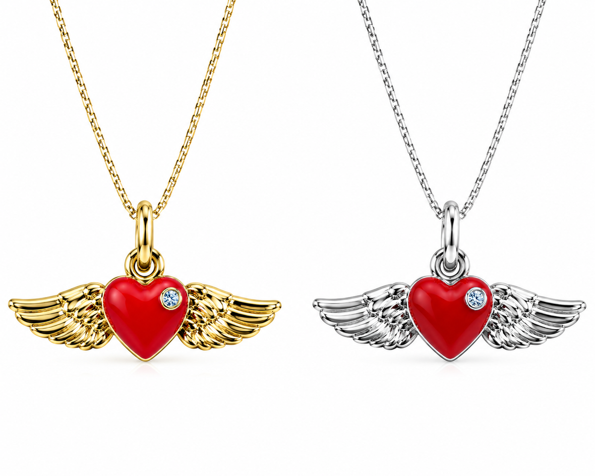 Two angel wing heart pendant necklaces on a white background, one in gold and one in silver, each featuring a red heart with a small clear gemstone. Works perfectly with any charm keeper, on earrings, or as a single pendant. 